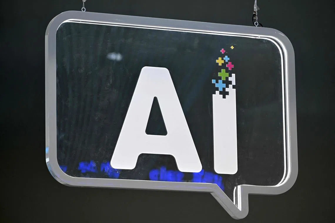 (FILES) This photograph shows an AI (artificial intelligence) logo at the Mobile World Congress (MWC), the telecom industry's biggest annual gathering, in Barcelona on February 27, 2024. Apps infused with AI are being marketed to schools across the world and governments are rushing to embrace the technology, despite experts raising serious doubts. (Photo by Josep LAGO / AFP)