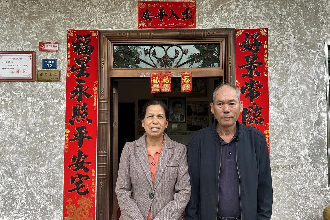Tea farmers Wang Juru (left) and Wang Bohe tripled their income after receiving input as part of China's national rural revitalisation drive.