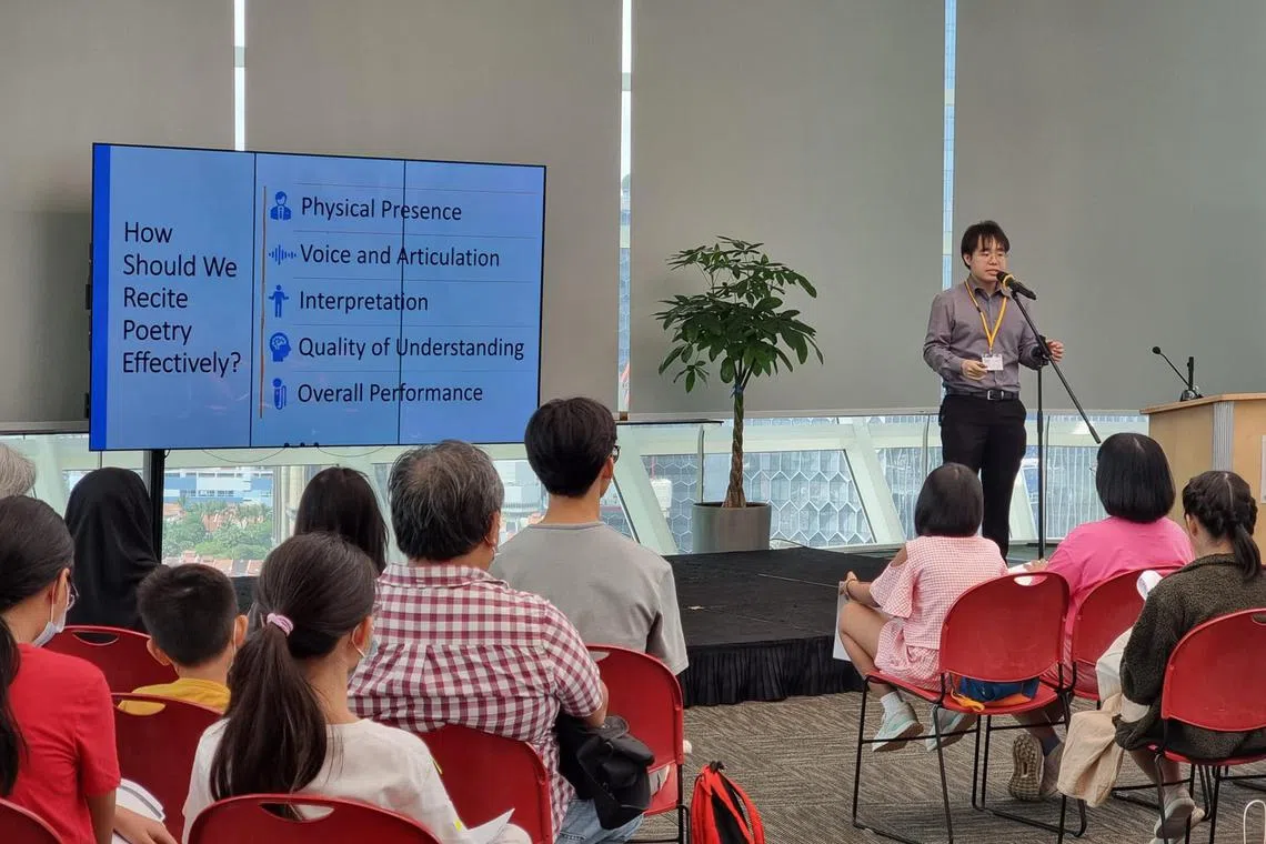 Ow Yeong Wai Kit, 34, poet and organiser of the National Poetry Recitation Competition facilitating a poetry recitation workshop at the National Library on June 9th 2023. 

Source: Poetry Festival Singapore