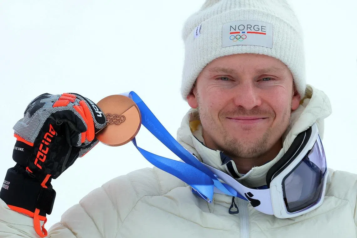 Milano Cortina 2026 Olympics - Alpine Skiing - Men's Slalom Victory Ceremony - Stelvio Ski Centre, Bormio, Italy - February 16, 2026. Bronze medallist Henrik Kristoffersen of Norway celebrates on the podium during the men's slalom victory ceremony REUTERS/Denis Balibouse
