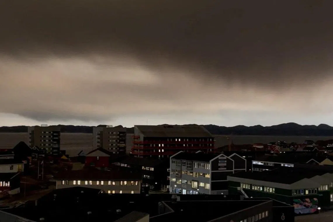 Smoke from the Canadian wildfires appears as a dark cloud over Nuuk, Greenland, September 25, 2023 in this screengrab taken from a social media video. Orla Joelsen/via REUTERS  THIS IMAGE HAS BEEN SUPPLIED BY A THIRD PARTY. MANDATORY CREDIT. NO RESALES. NO ARCHIVES.