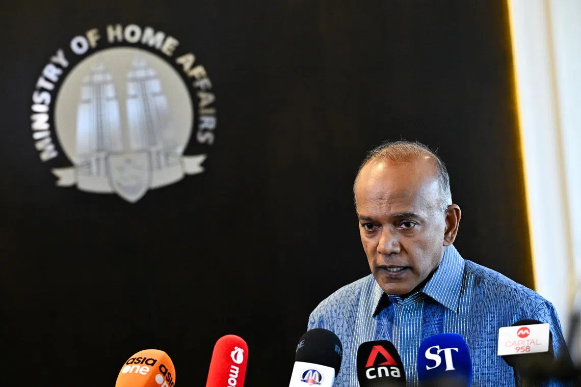 Law and Home Affairs Minister K. Shanmugam speaking to the media on July 15.