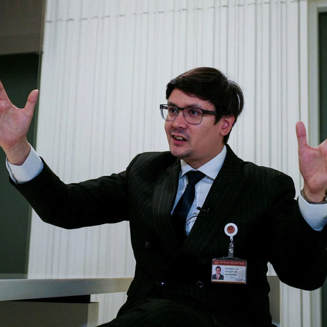 FILE PHOTO: Chair of the House Committee on National Security, Border Affairs, National Strategy and National Reform and a member of the opposition People's Party, Rangsiman Rome, speaks during an interview with Reuters amid a mounting crackdown on scam centres operating along a porous border in Bangkok, Thailand February 26, 2025. REUTERS/Thomas Suen/File Photo