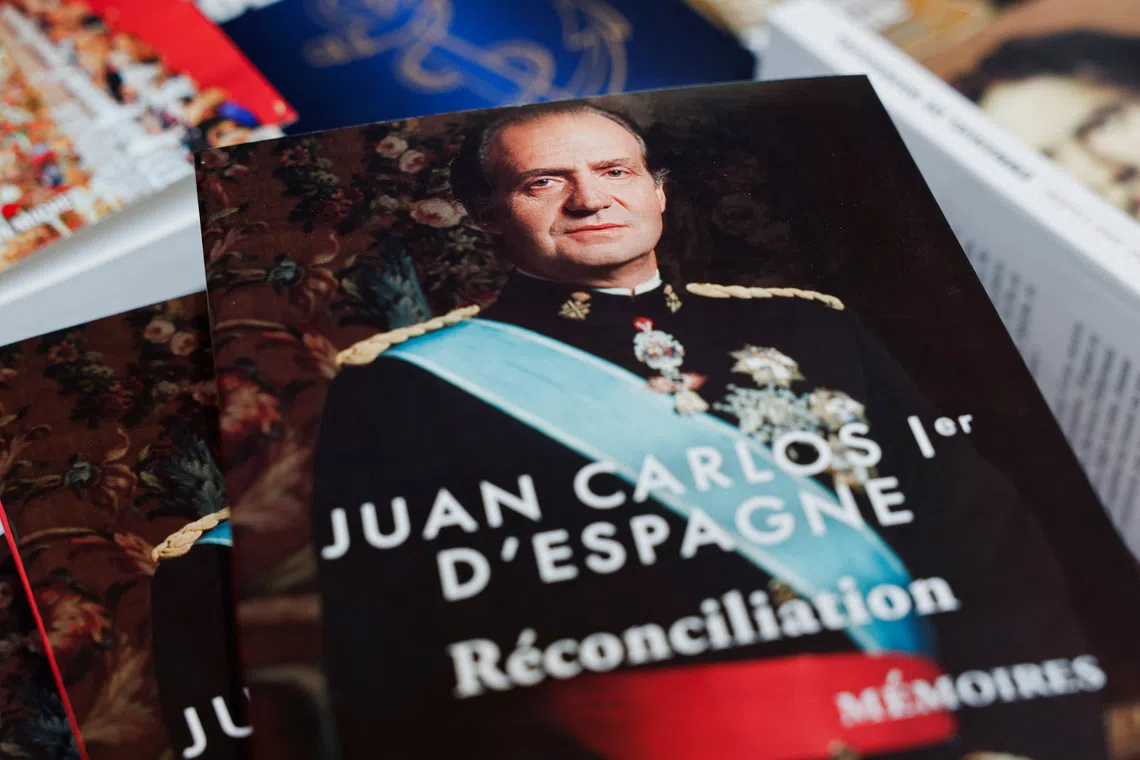 Copies of the book \"Reconciliation\" written by former King Juan Carlos I of Spain, inside the Galignani bookstore in Paris, France, November 5, 2025. REUTERS/Benoit Tessier