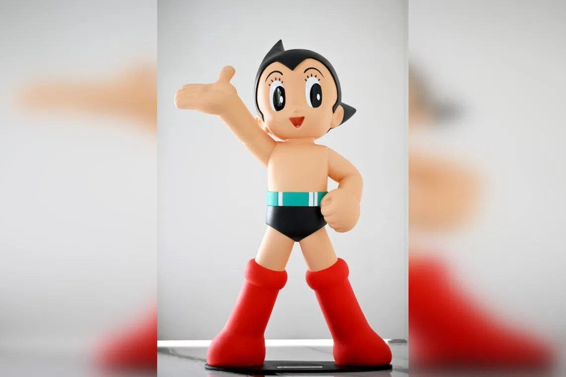 Astro Boy, a cute and friendly robot, reflects the more benign view Asian societies have of AI and technology compared with the West, says the writer.