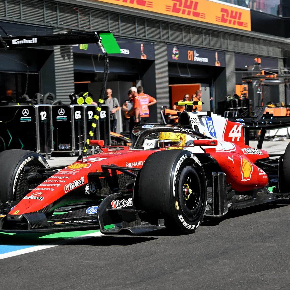 Formula One F1 - Hungarian Grand Prix - Hungaroring, Budapest, Hungary - July 26, 2026 Ferrari's Lewis Hamilton in the pit lane during the race Pool via REUTERS/Andrej Isakovic