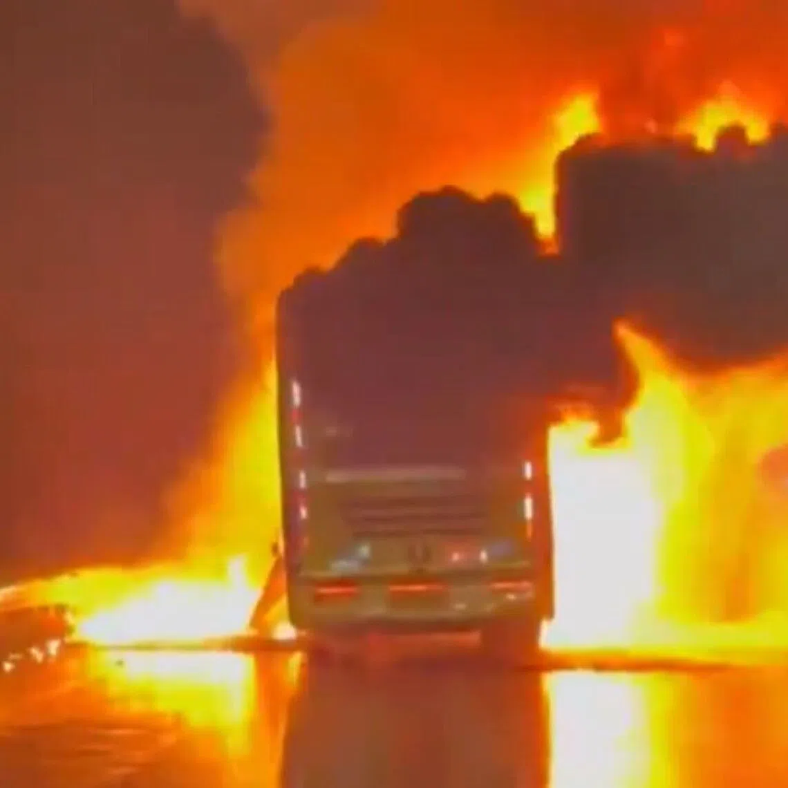 A screengrab from a video circulating on the internet shows the bus on fire. 