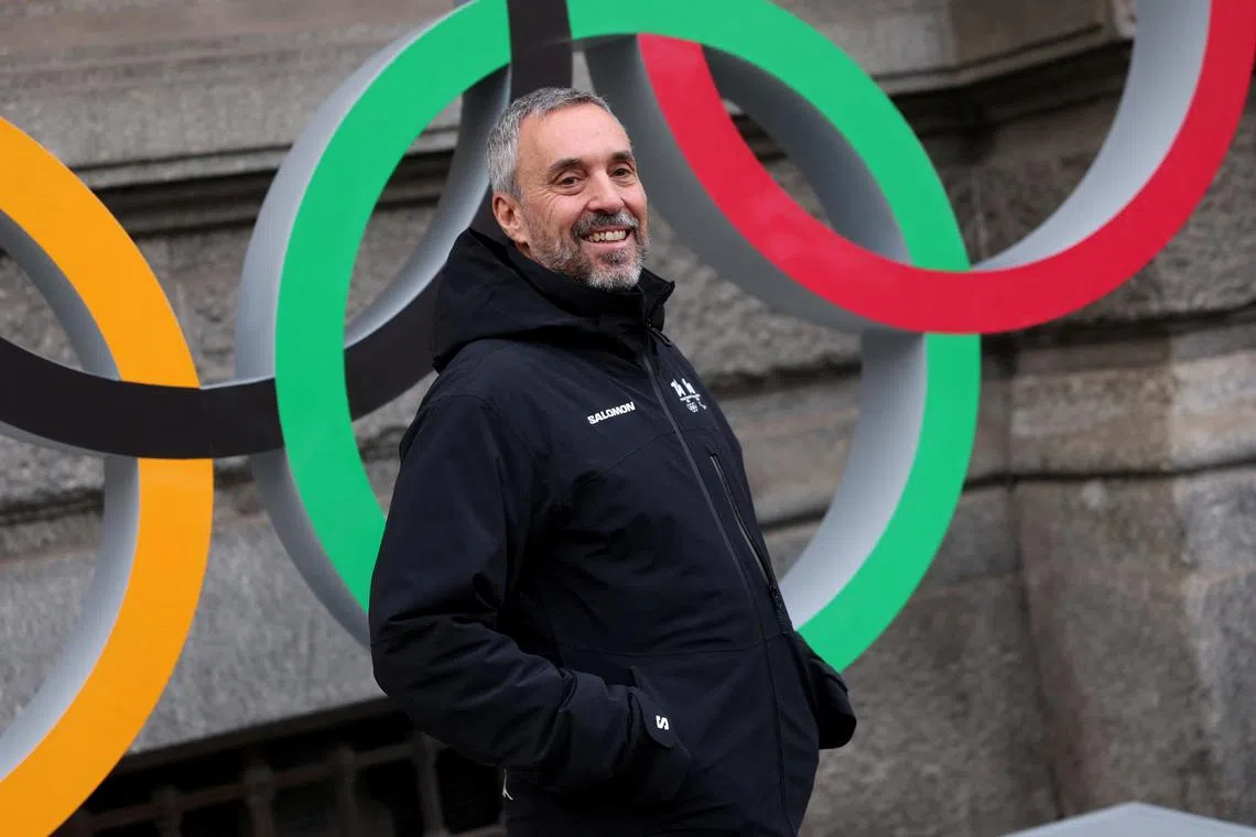 FILE PHOTO: Andrea Varnier, CEO of of the Milano Cortina 2026 Foundation, poses for photographers in front of an installation depicting the Olympic Rings, during a ceremony that marks two years until the 25th edition of the Olympic Winter Games, in Milan, Italy, February 6, 2024. REUTERS/Claudia Greco/File Photo