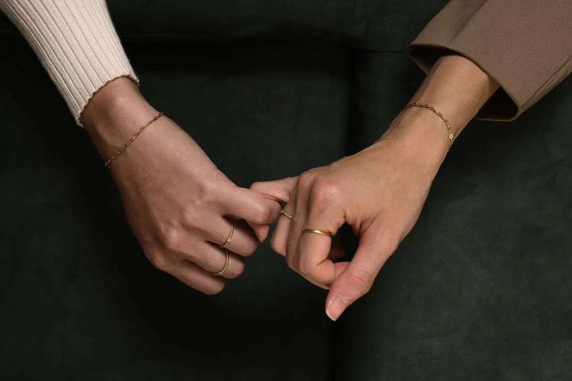 More Singaporeans are getting solid gold or silver jewellery welded together with no clasp or tie to their body.              