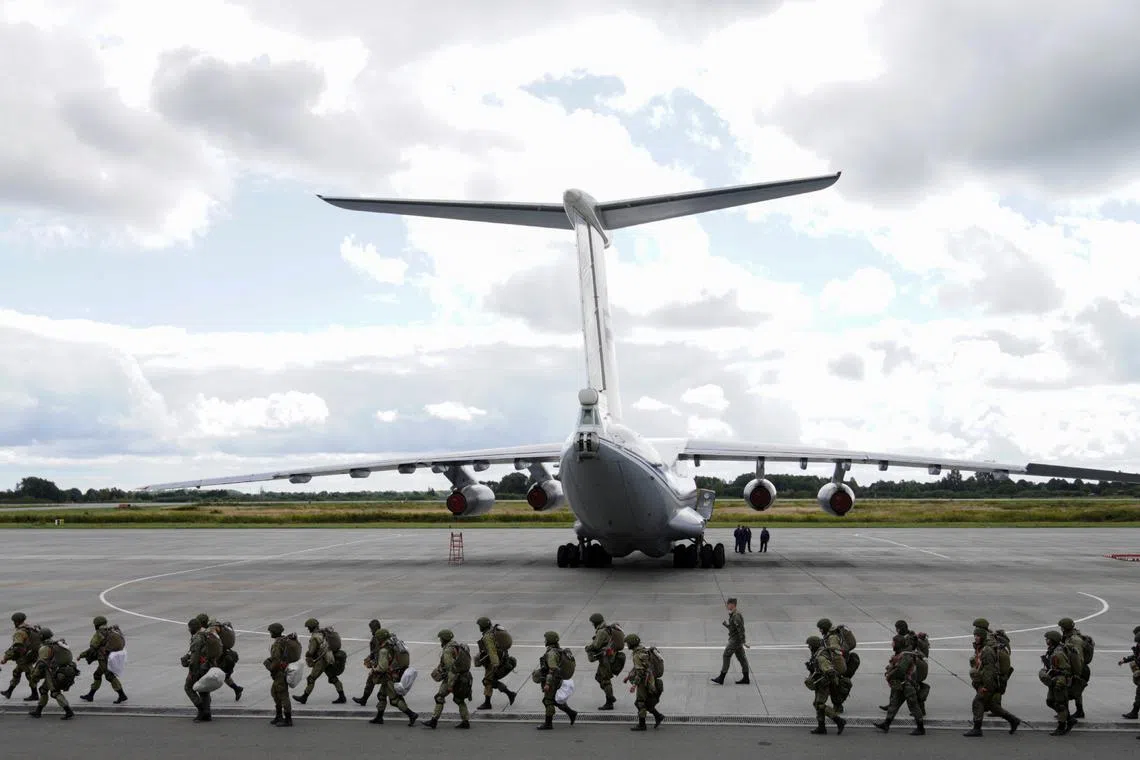 Russian paratroopers taking part in the Zapad military exercise staged by the armed forces of Russia and Belarus at an aerodrome in Kaliningrad Region, Russia, in 2021. 