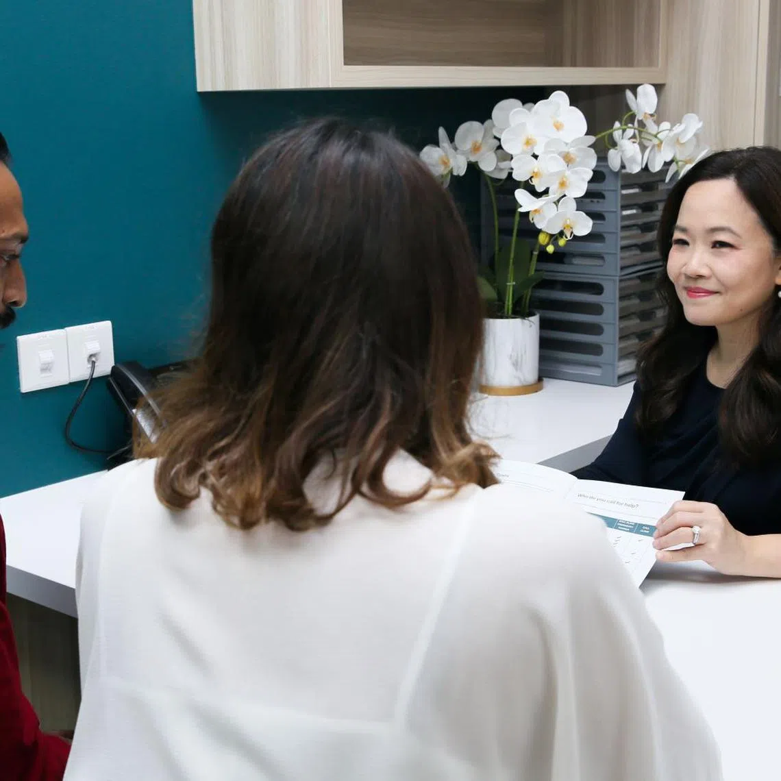 IVF specialist and gynecologist Dr Kelly Loi speaking to patients