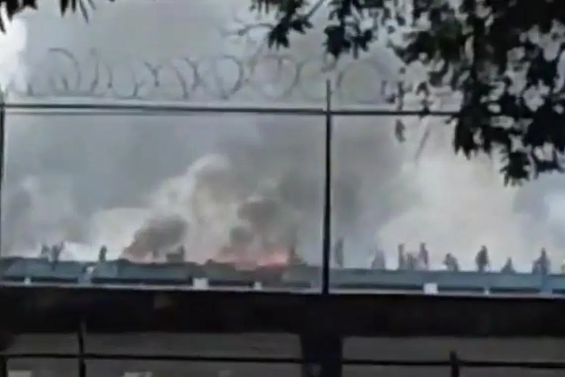 Inmates said they were peacefully protesting when prison staff opened fire and left some wounded.