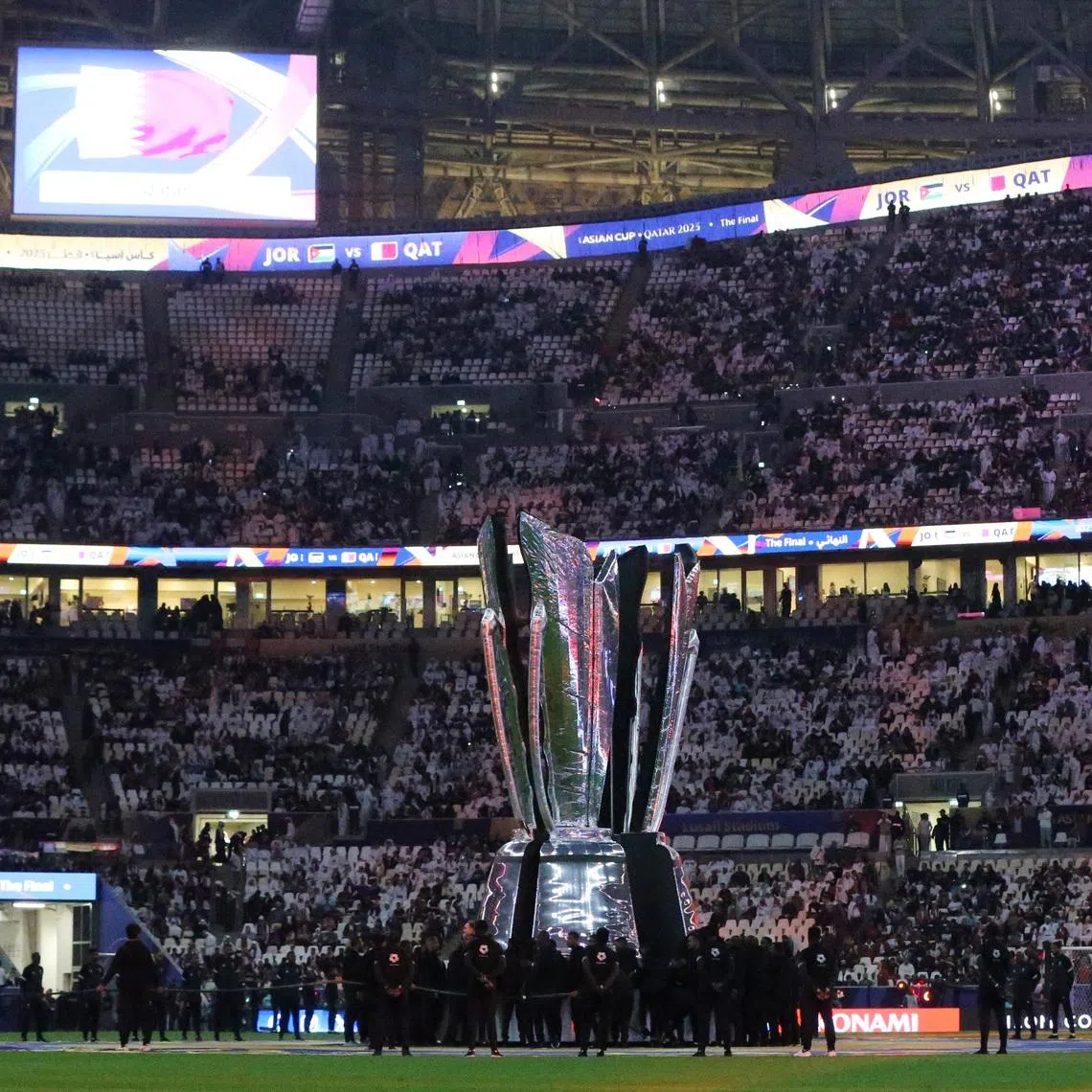 FILE PHOTO: Soccer Football - AFC Asian Cup - Final - Jordan v Qatar - Lusail Stadium, Lusail, Qatar - February 10, 2024 A giant AFC Asian Cup trophy is displayed inside the stadium before the match REUTERS/Ibraheem Al Omari/File Photo