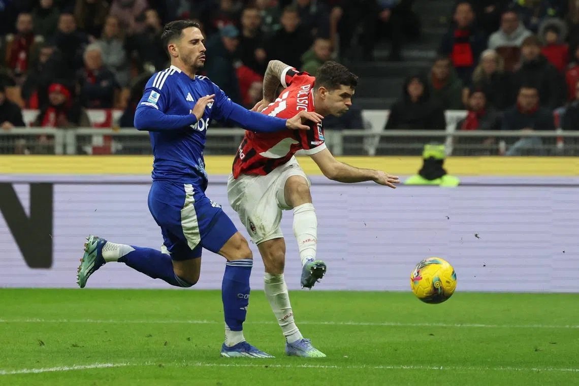 FILE PHOTO: Soccer Football - Serie A - AC Milan v Como - San Siro, Milan, Italy - March 15, 2025 AC Milan's Christian Pulisic scores their first goal REUTERS/Claudia Greco/File Photo