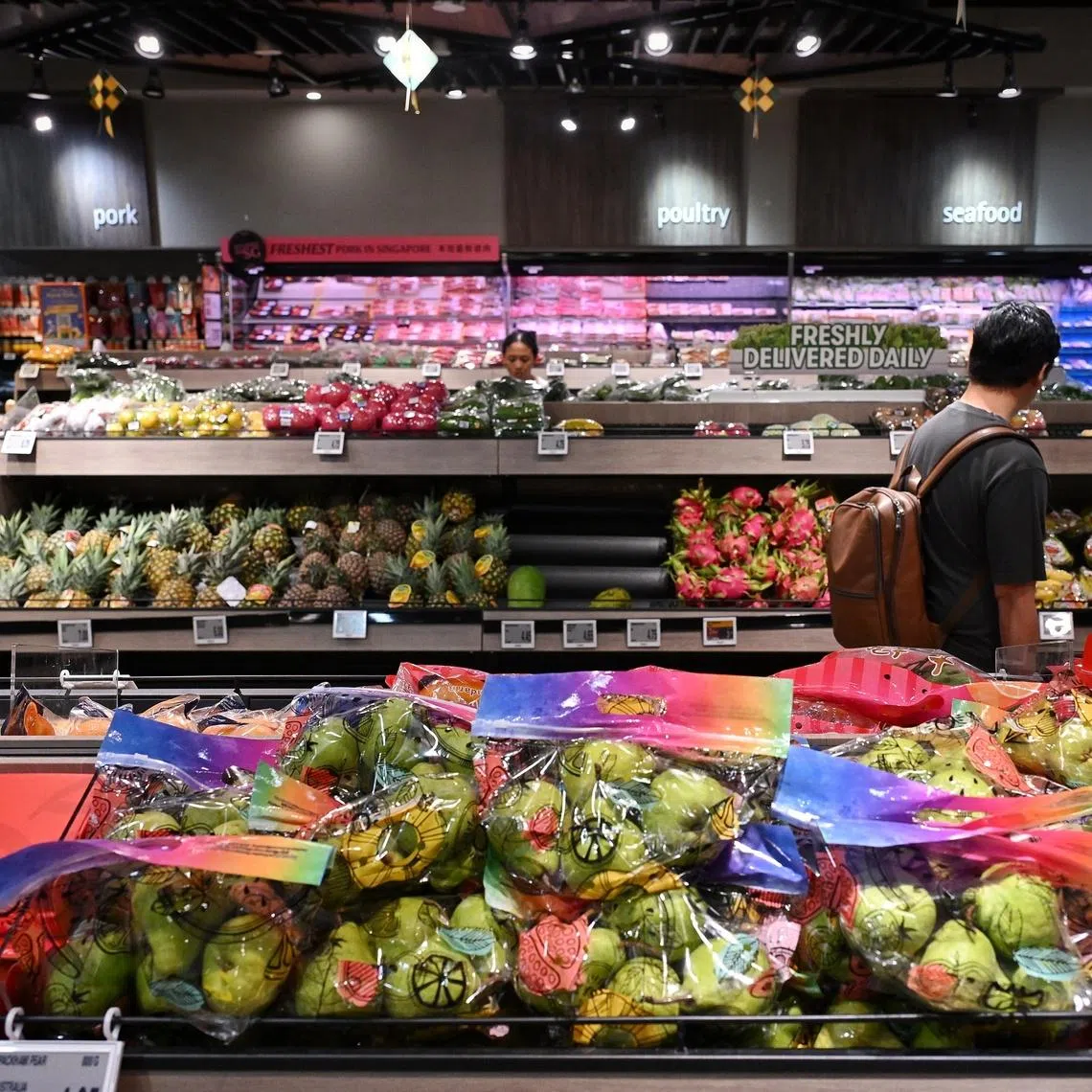 FairPrice's price freeze from April 9 to May 31 will include house-brand rice, oil, eggs, fresh and frozen pork and chicken.