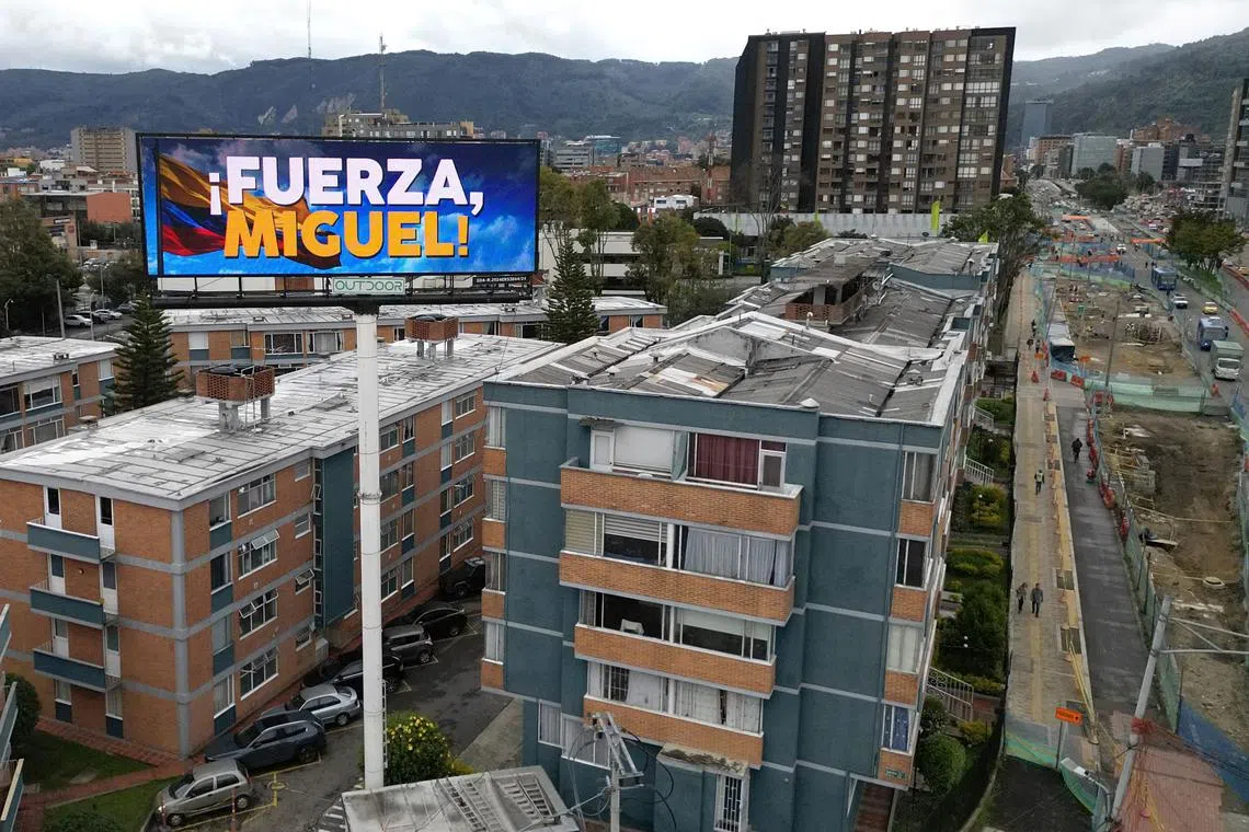 A billboard in Bogota reading "Strength Miguel" in support of Colombian Senator Miguel Uribe who was shot at a June 7 rally.