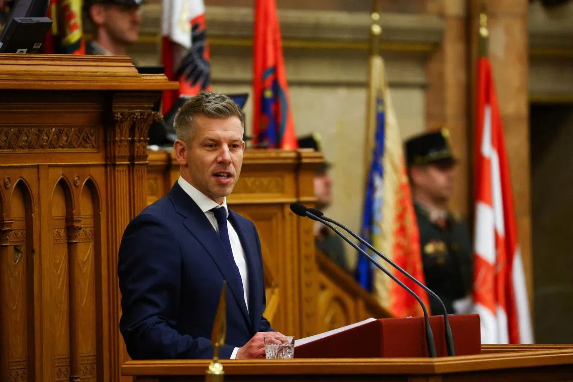 Hungarian Prime Minister Peter Magyar delivers a speech on the day new members of government take their oath of office in the Parliament, in Budapest, Hungary, May 12, 2026. REUTERS/Bernadett Szabo