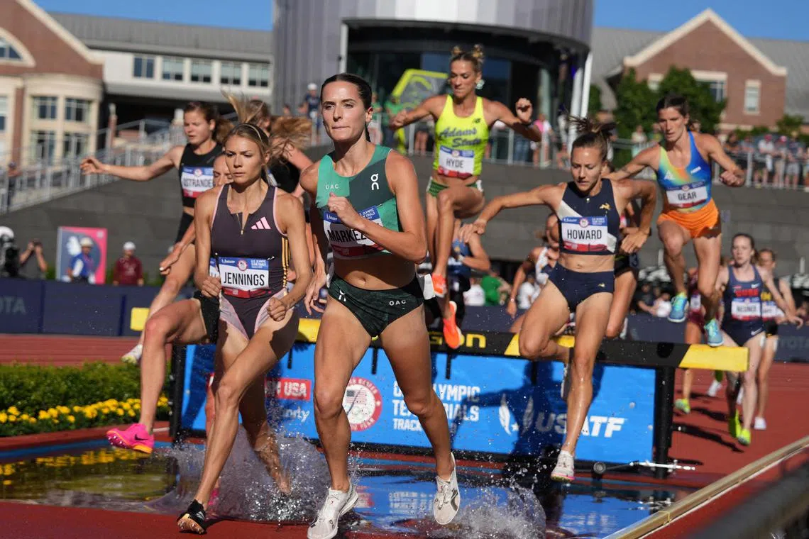 Athletes competing in the women's steeplechase during the US Olympic Team Trials at Hayward Field. 