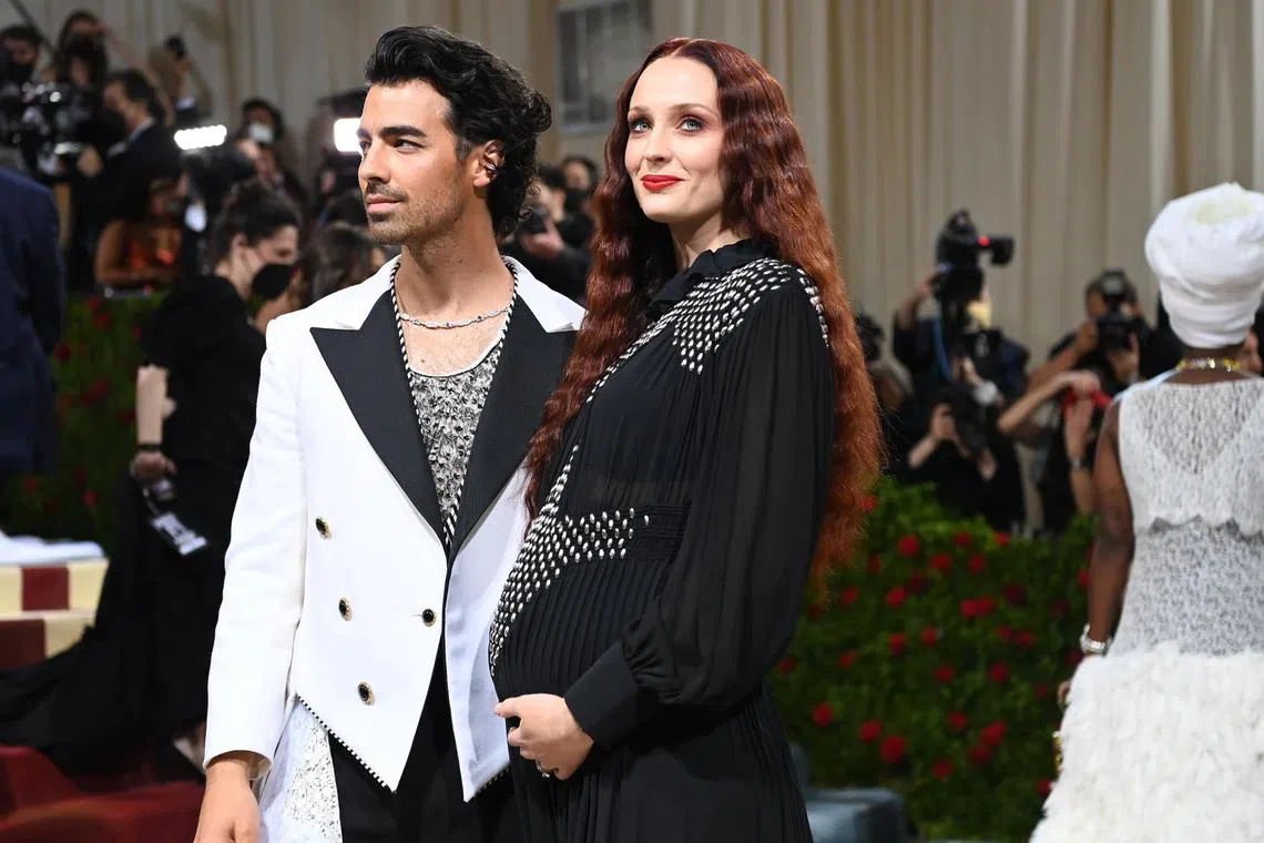 Joe Jonas (left) and Sophie Turner (right) at the Metropolitan Museum of Art's Costume Institute benefit gala in New York on May 2, 2022. 