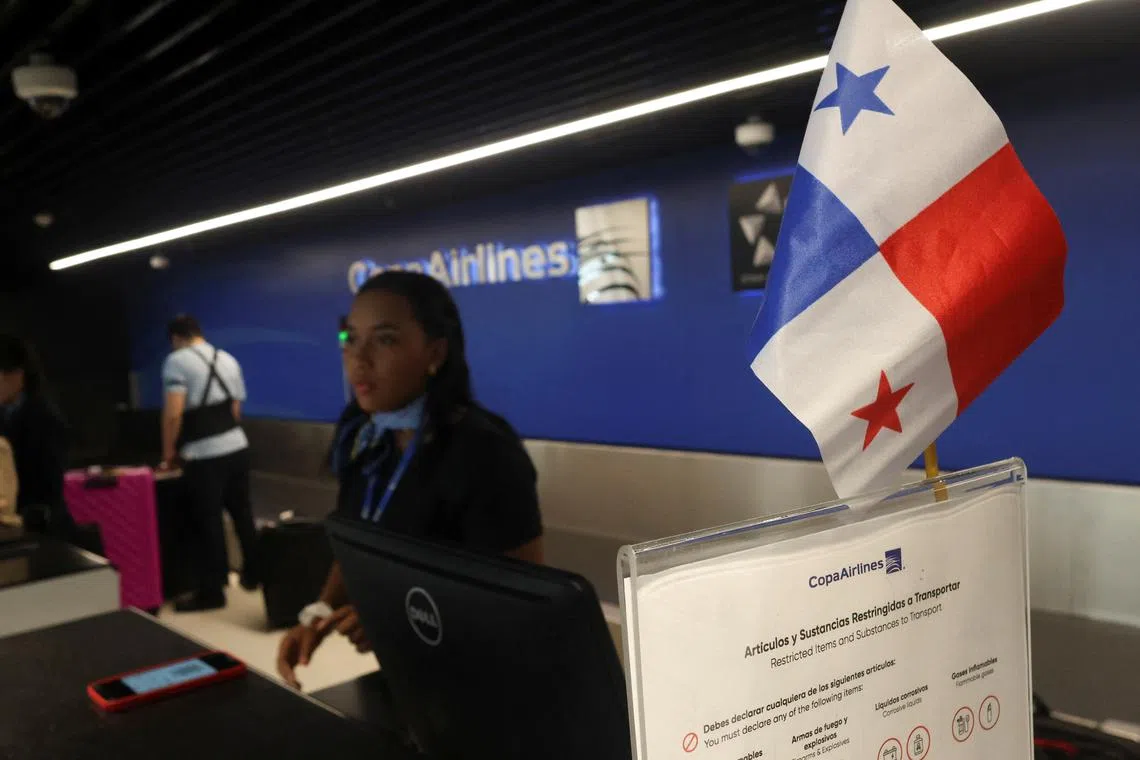 A Panama’s flag on the counter of Copa Airlines, following Venezuela's decision to temporarily suspend all commercial flights between Panama and Venezuela, at Tocumen International Airportt, in Panama City, Panama July 30, 2024. REUTERS/Aris Martinez