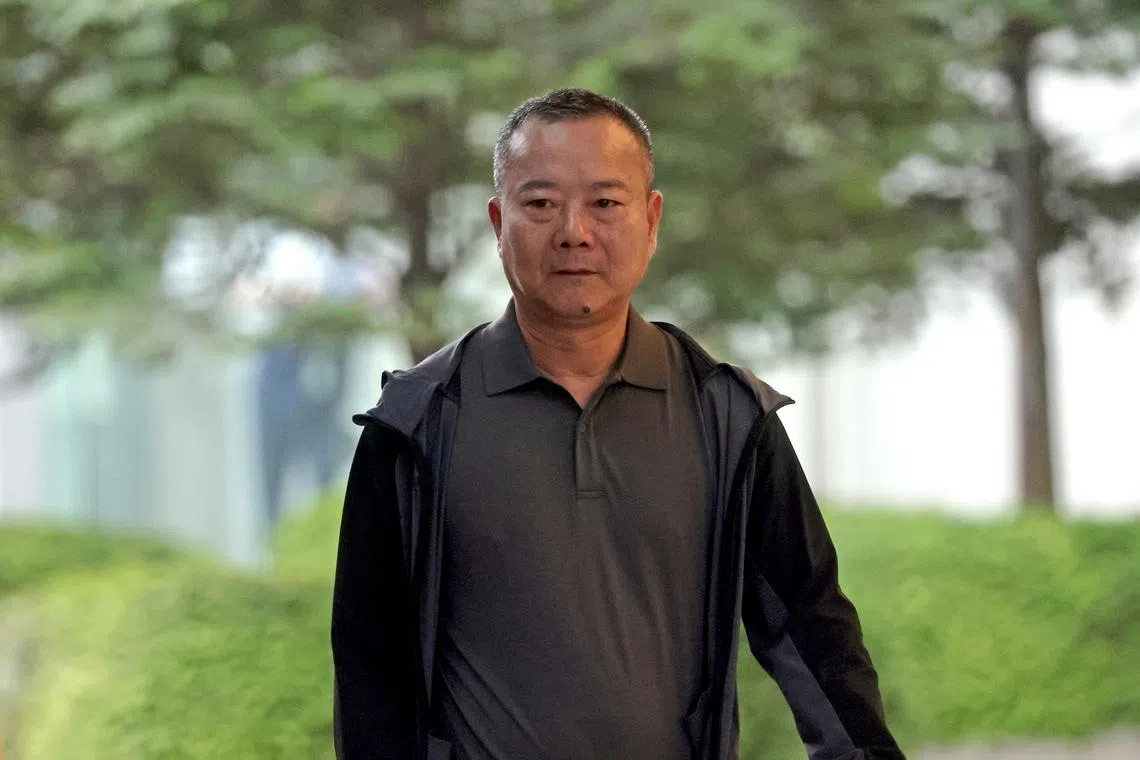 Zhan Guotuan had provided the money to buy three landed properties in East Coast Road worth more than $6 million in total.