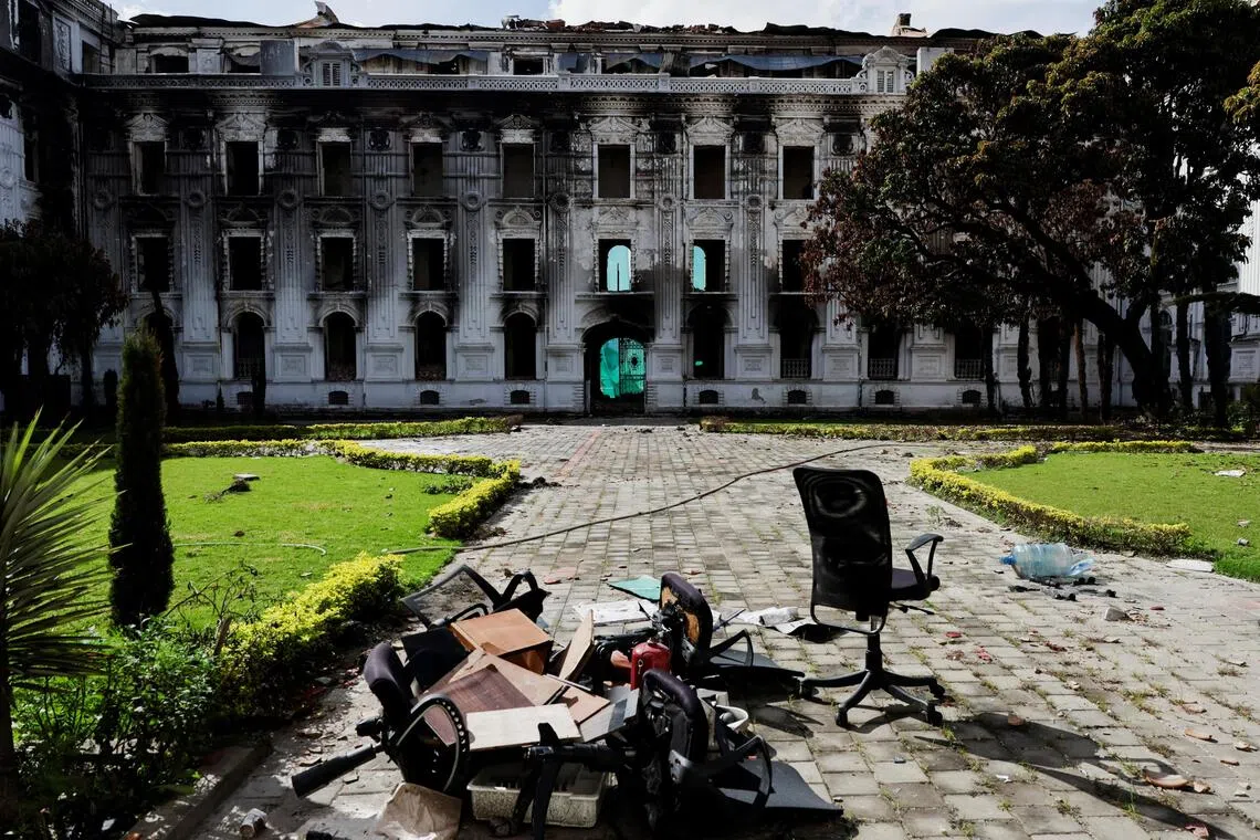 Damaged furniture outside the Nepal government offices after protests in Kathmandu in September.