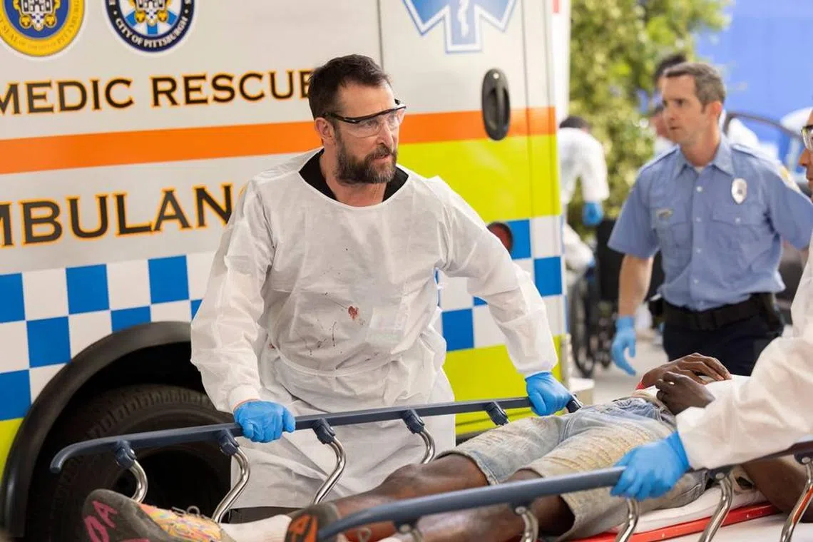 Noah Wyle plays an emergency department attending in gritty medical drama The Pitt.