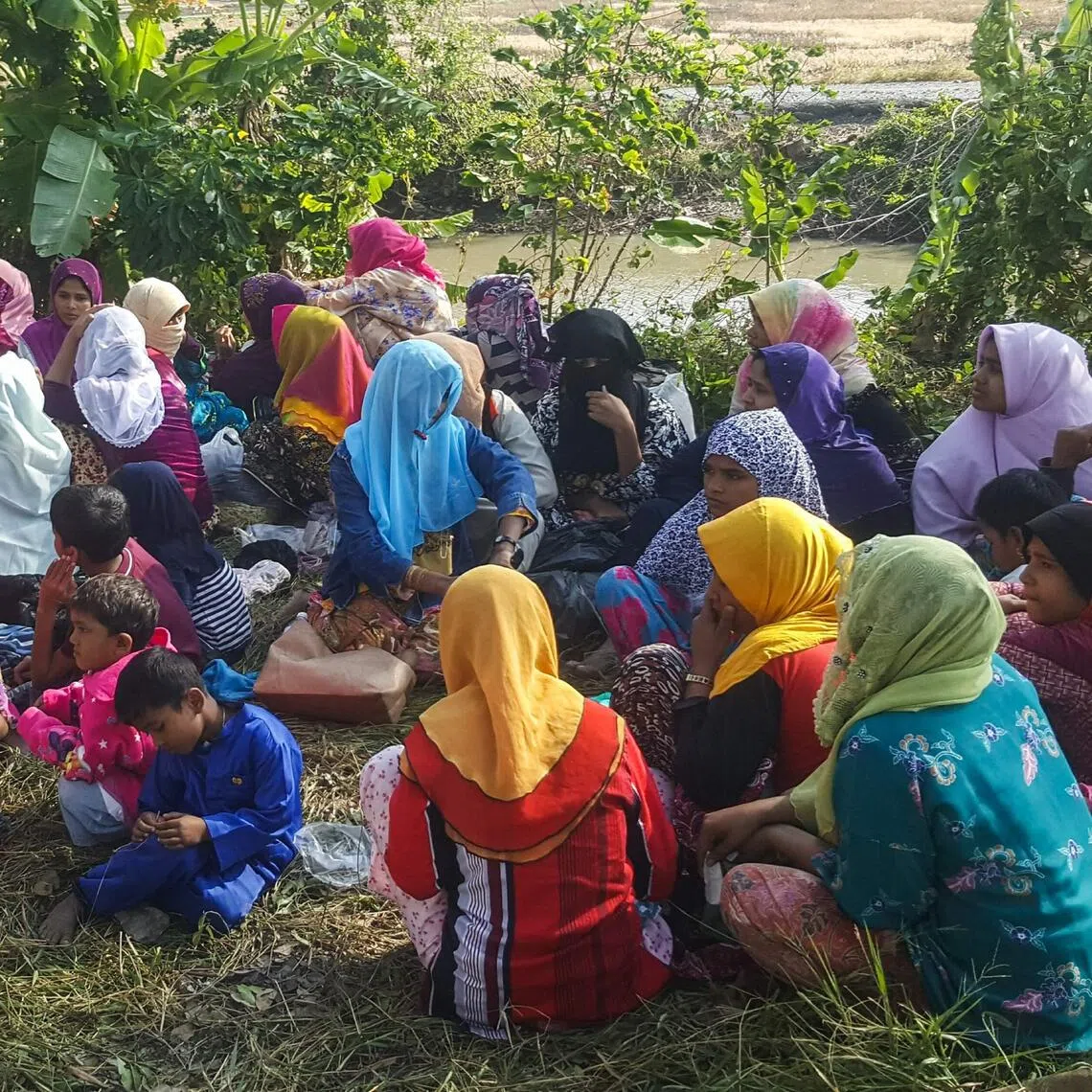 This 2019 photo shows Rohingya refugees who landed on an isolated northern shore near the Malaysia-Thai border and were detained by Malaysian immigration authorities.