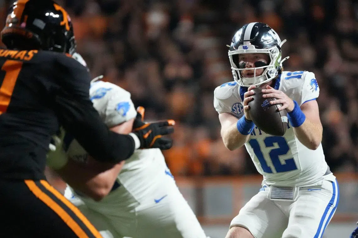Nov 2, 2024; Knoxville, Tennessee, USA; Kentucky Wildcats quarterback Brock Vandagriff (12) takes the snap against the Tennessee Volunteers during the first half at Neyland Stadium. Mandatory Credit: Saul Young/USA TODAY Network via Imagn Images/ File Photo