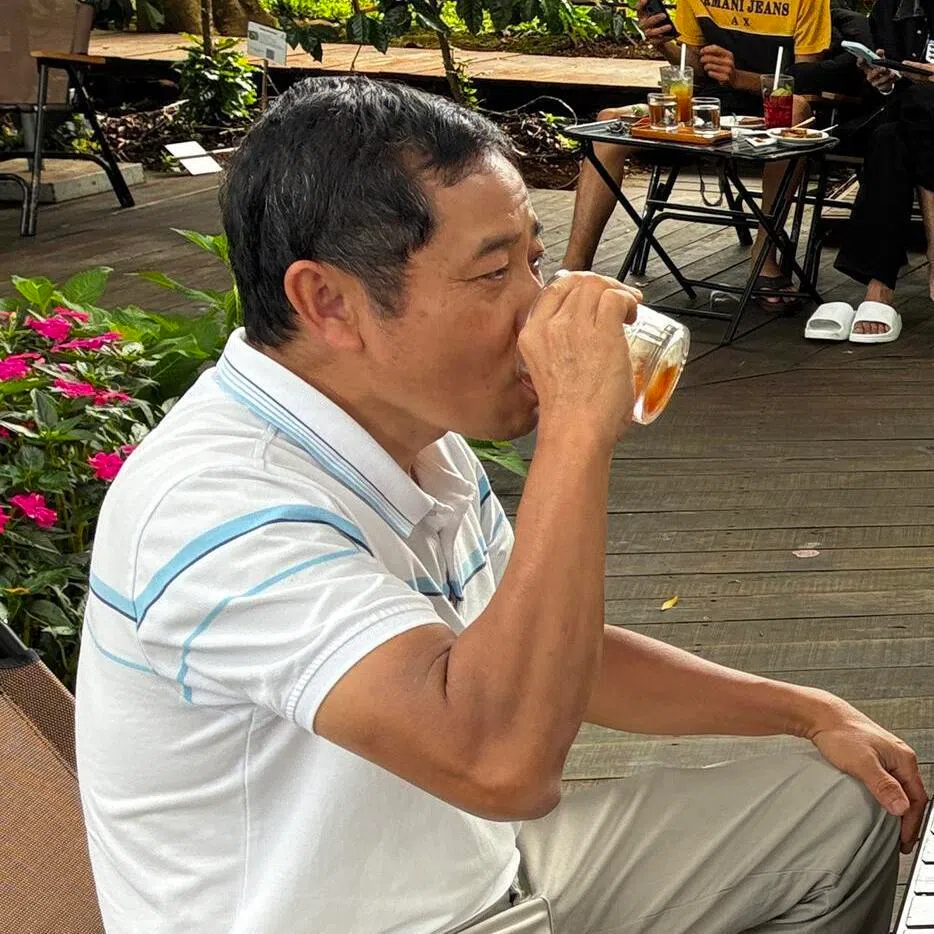 Aeroco’s owner Le Dinh Tu drinking coffee with visitors at the cafe on his farm near Ea Kao Lake in Buon Ma Thuot, Vietnam’s coffee capital in Dak Lak province, on June 30.