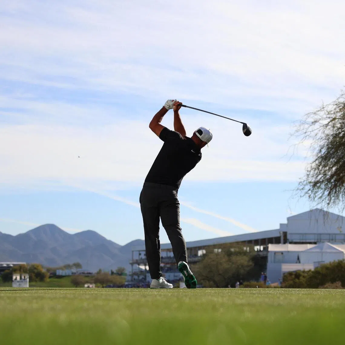 Brooks Koepka of the United States tees off hole 17 during the second round of the WM Phoenix Open.