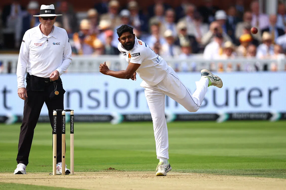 FILE PHOTO: Cricket - Second Test - England v Sri Lanka - Lord's Cricket Ground, London, Britain - August 30, 2024 Sri Lanka's Prabath Jayasuriya in action Action Images via Reuters/Andrew Boyers/File Photo