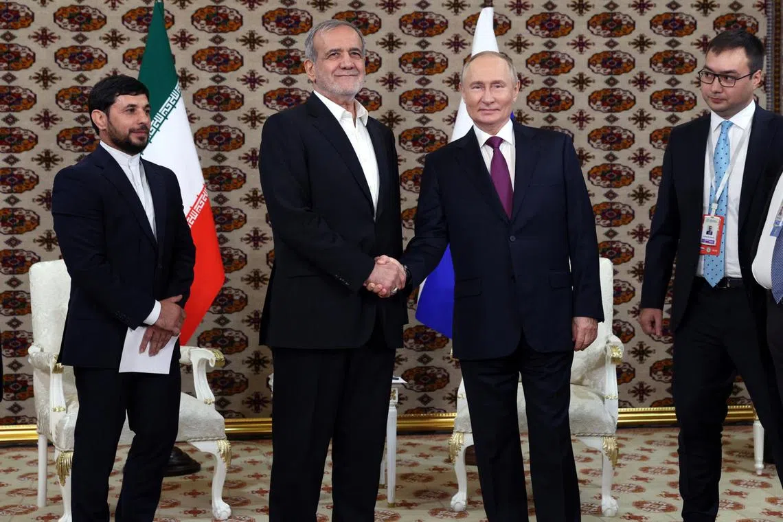 Russian President Vladimir Putin (centre, right) and Iranian counterpart Masoud Pezeshkian on Oct 11 hailed their countries growing economic ties and similar views on world affairs.
