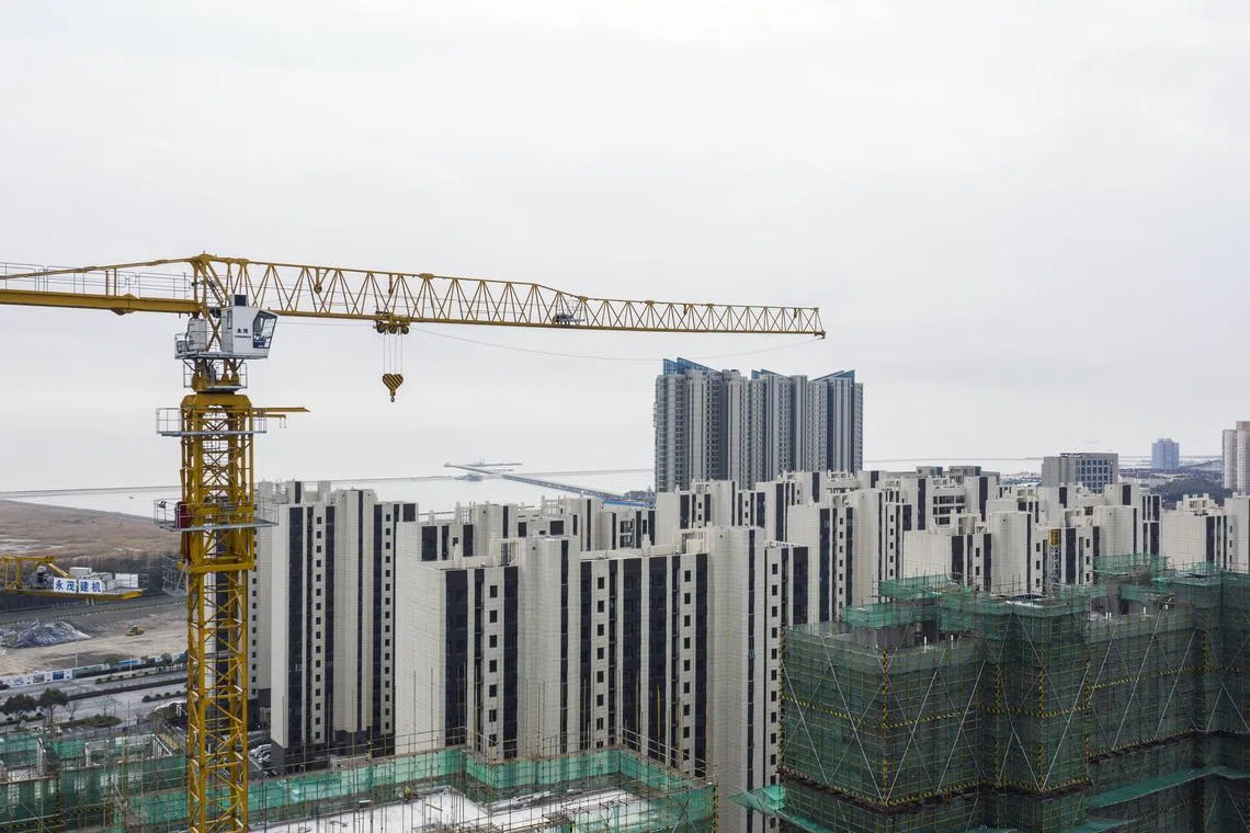 Top Chinese developer Country Garden Holdings said it expected to swing to a loss for 2022 amid a sluggish property market. 