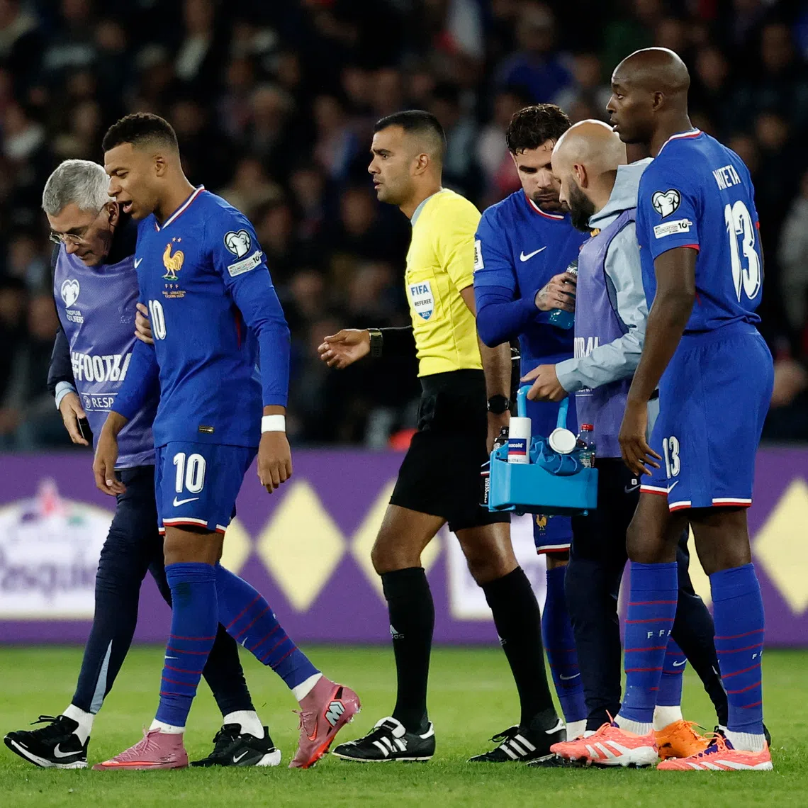 Soccer Football - FIFA World Cup - UEFA Qualifiers - Group D - France v Azerbaijan - Parc des Princes, Paris, France - October 10, 2025 France's Kylian Mbappe reacts after sustaining an injury REUTERS/Benoit Tessier