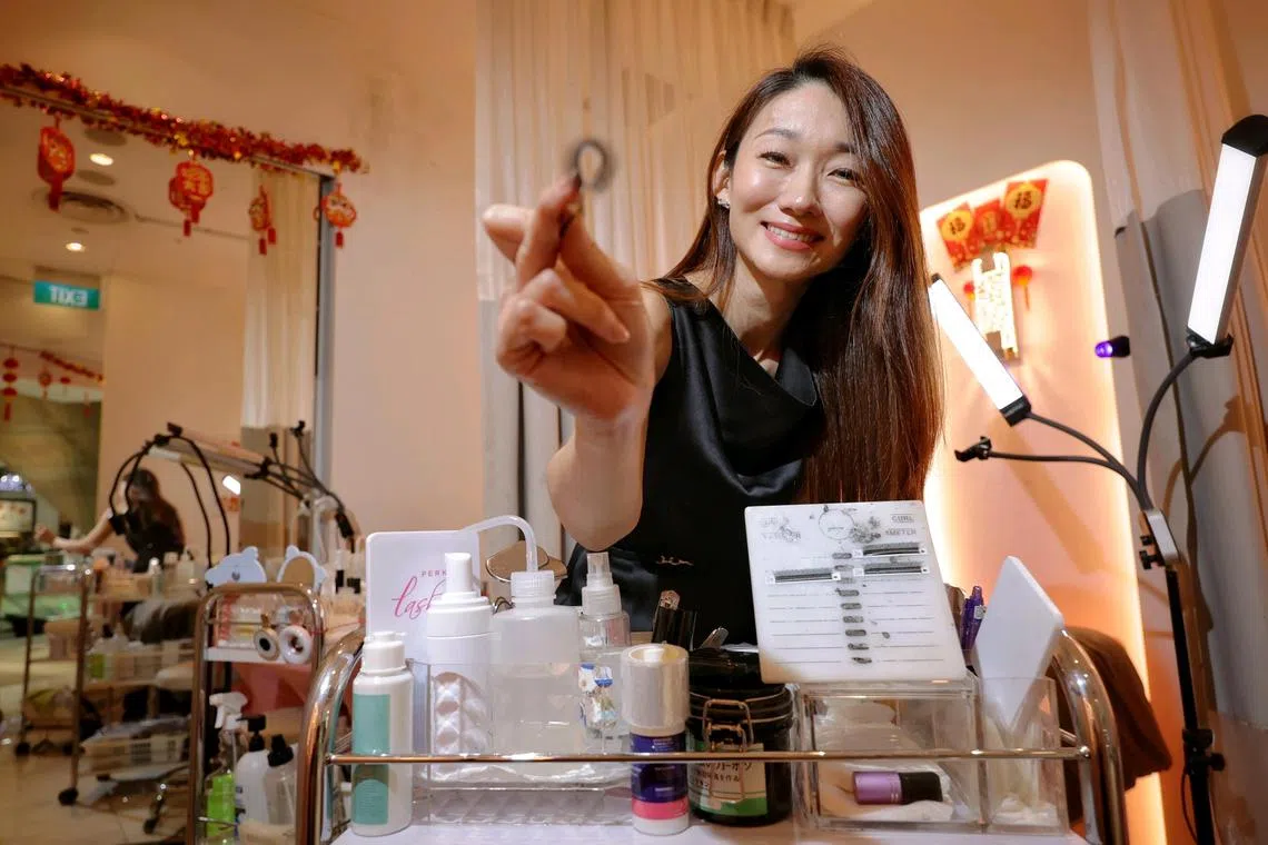 Portrait of Ms Jasmin Tay, founder of Perky Lash, at the outlet in Tampines 1 on Feb 3, 2025.