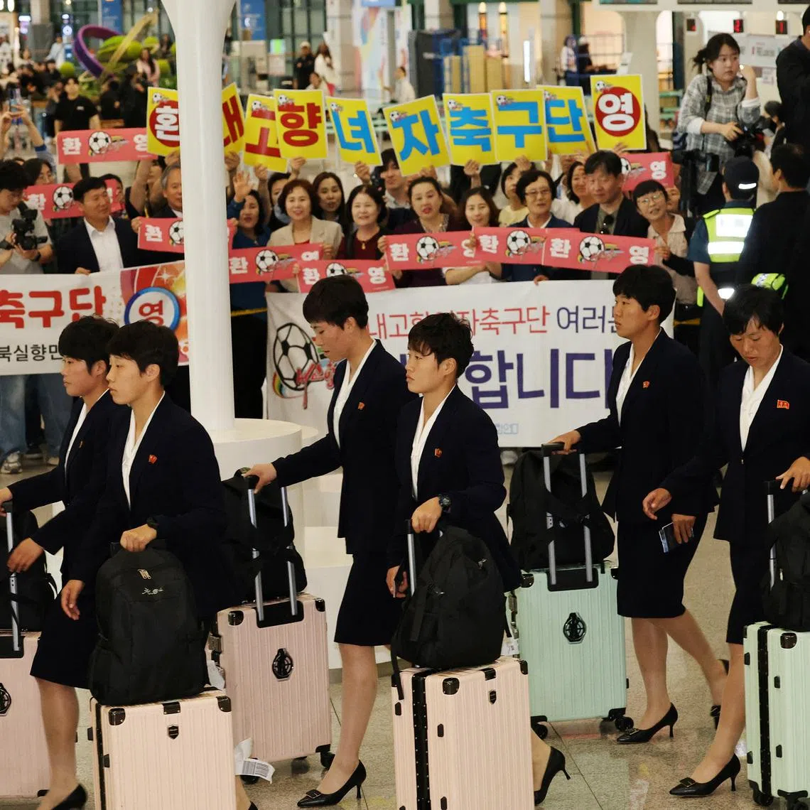 North Korea's Naegohyang Women’s FC were greeted by cheers from activists when they arrived in South Korea on May 17.