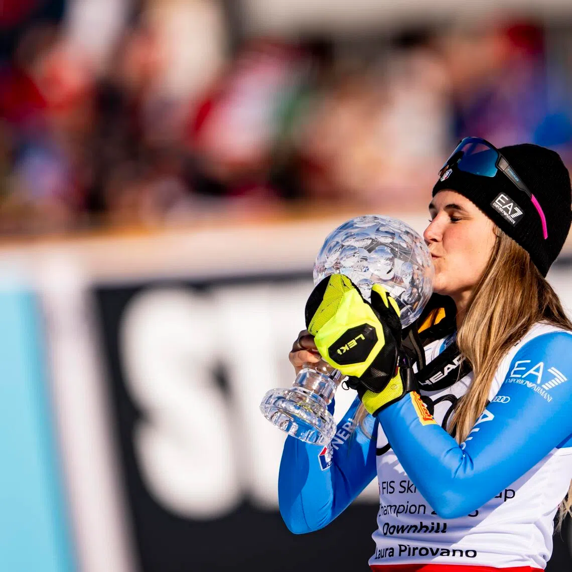Laura Pirovano of Italy celebrates with the women's downhill overall winner's crystal globe trophy at the FIS Alpine Skiing World Cup Finals in Kvitfjell, Norway on March 21, 2026.