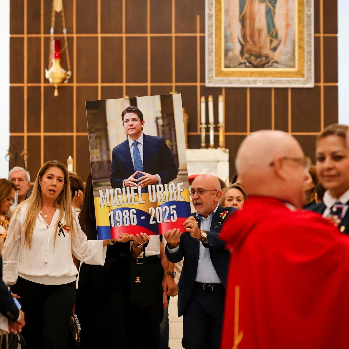 People attend a Memorial Mass in remembrance of Colombian politician Miguel Uribe, in Miami, Florida, U.S., August 14, 2025.   REUTERS/Eva Marie Uzcategui