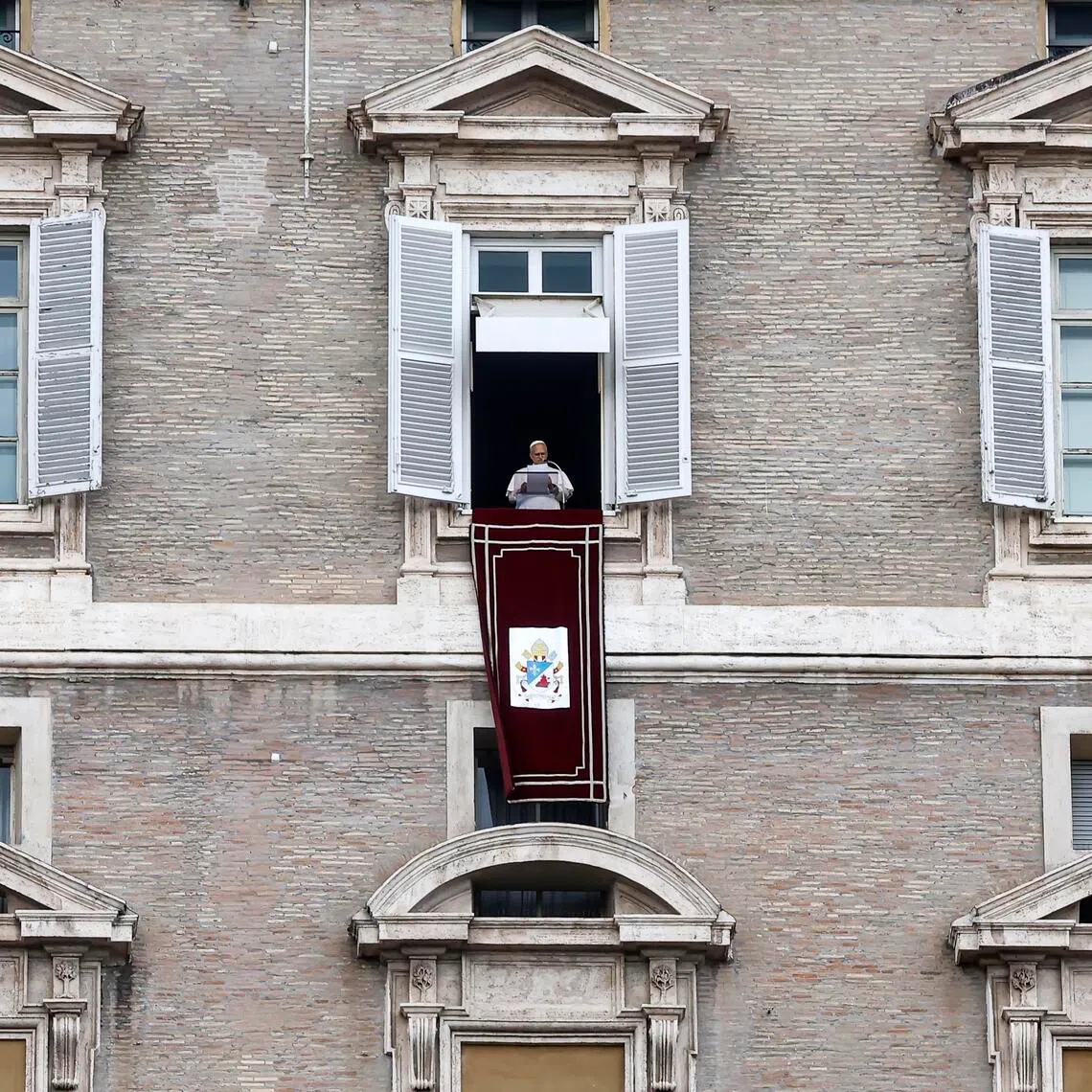 Pope Leo XIV leading the traditional Sunday Angelus prayer from the window of his office overlooking St Peter’s Square on Oct 18.