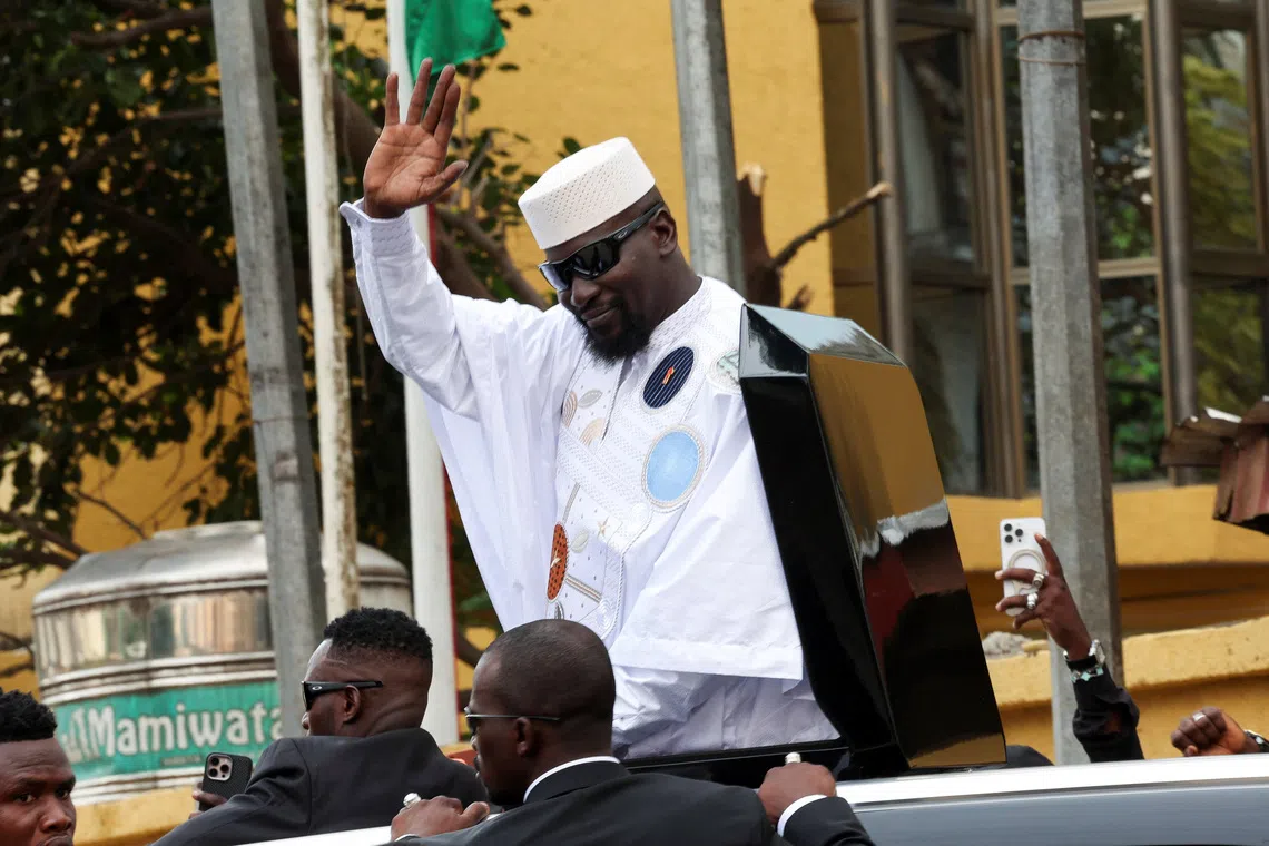 Guinean leader Mamadi Doumbouya waves after submitting his candidacy at the Supreme Court ahead of the presidential election scheduled for December 28, in Conakry, Guinea, November 3, 2025. REUTERS/Luc Gnago
