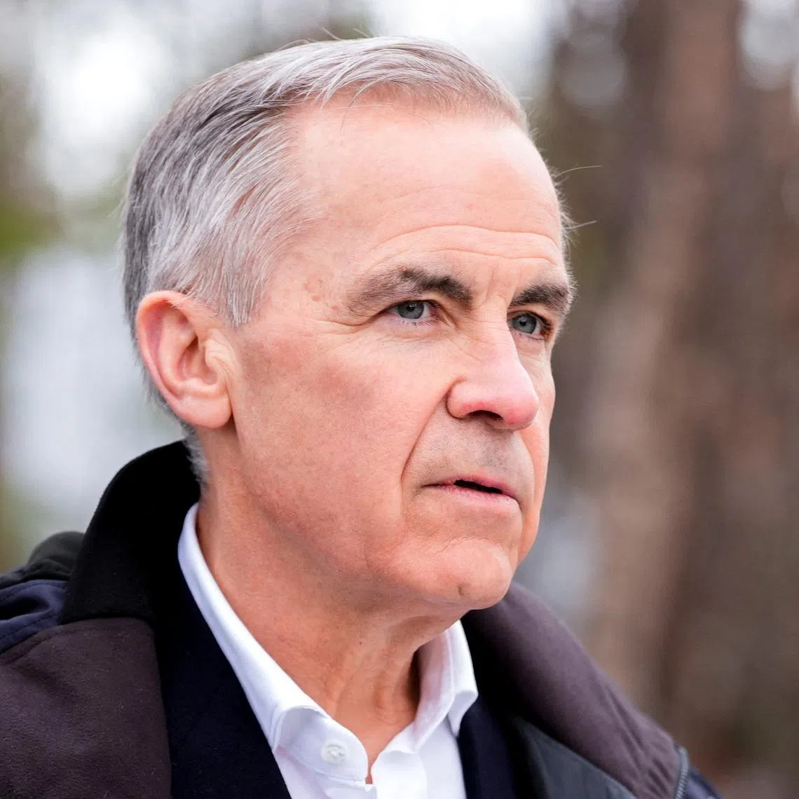 Canadian Prime Minister Mark Carney during Cold Response 2026 military exercise,  in Bardufoss, Norway, March 13, 2026.   NTB/Lise Aserud /via REUTERS