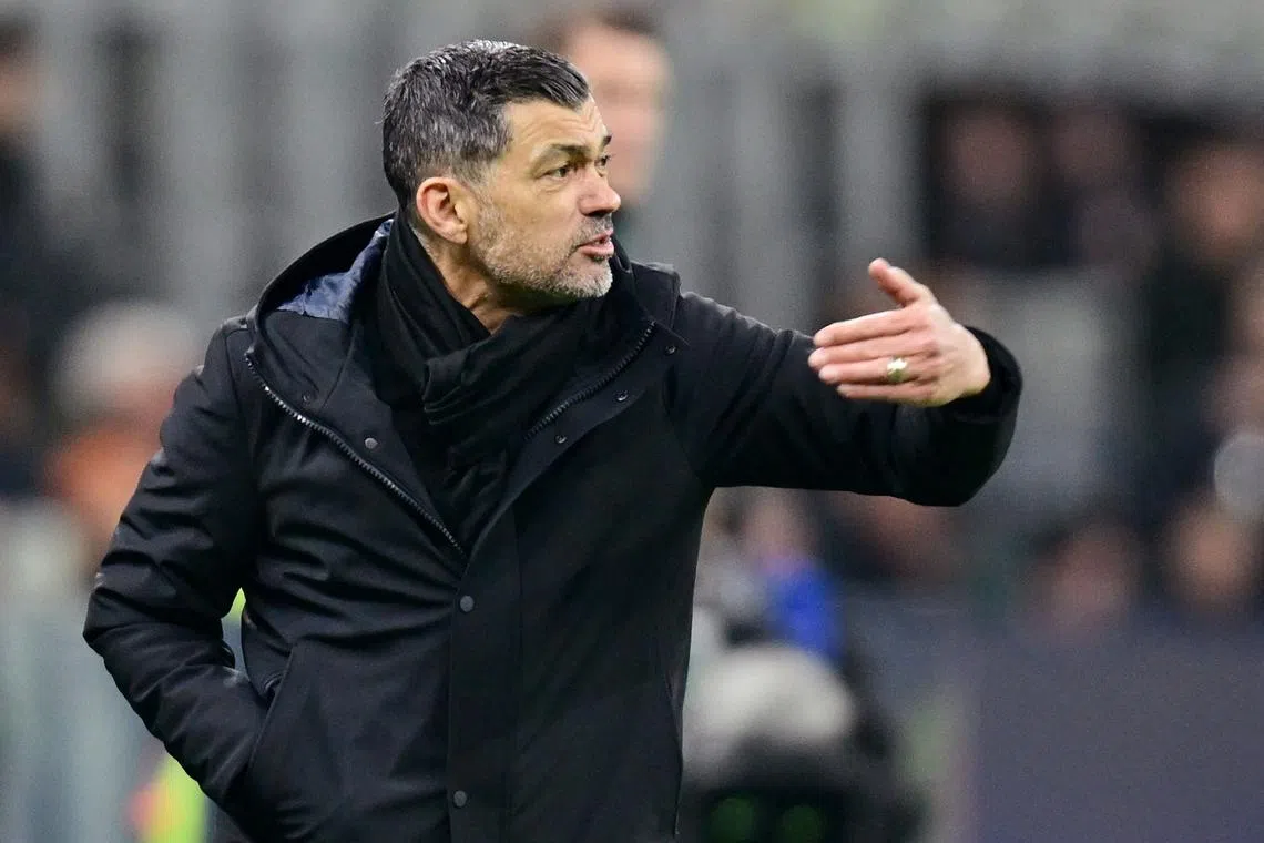 Soccer Football - Champions League - Knockout Phase Playoff - Second Leg - AC Milan v Feyenoord - San Siro, Milan, Italy - February 18, 2025 AC Milan coach Sergio Conceicao reacts REUTERS/Daniele Mascolo