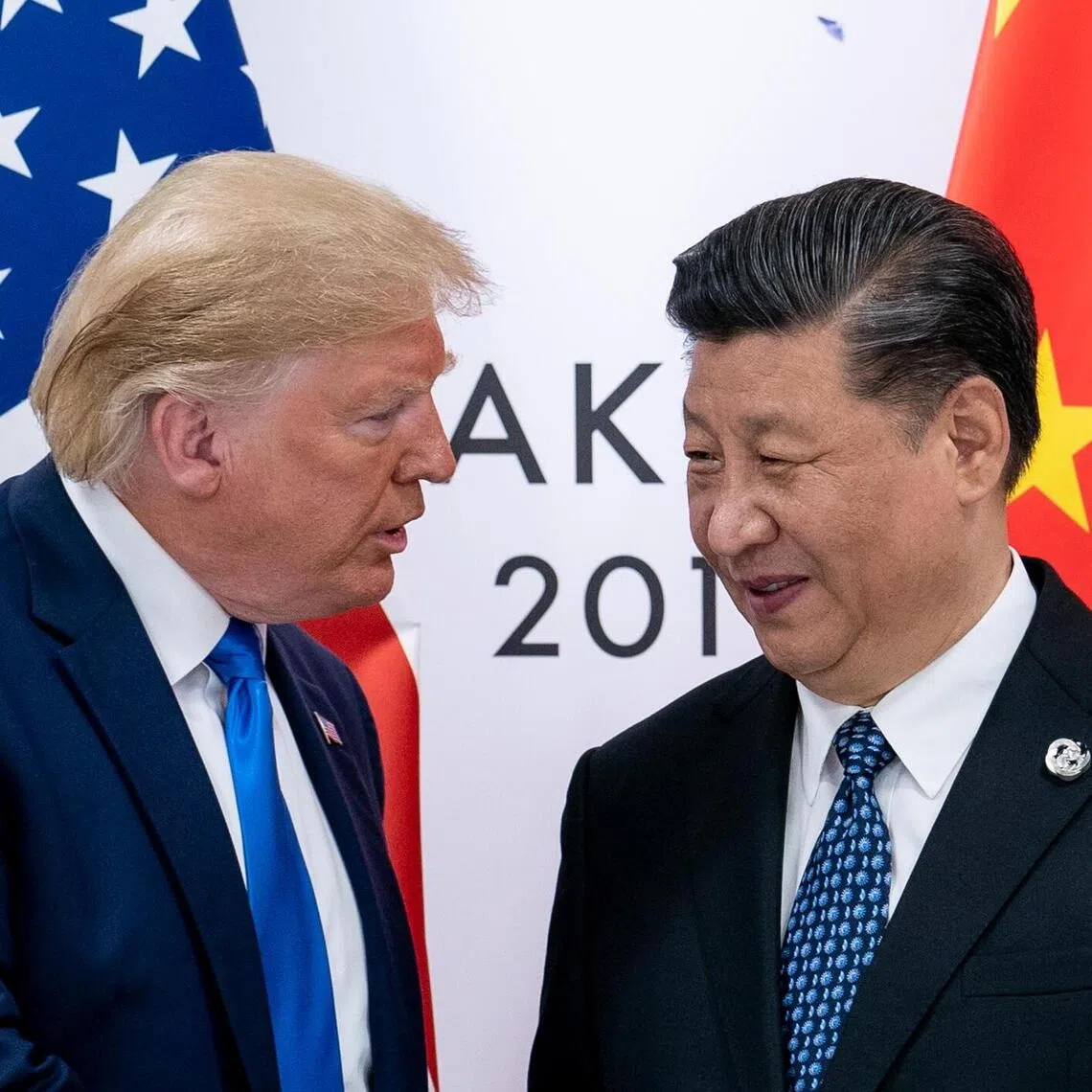 FILE Ñ President Donald Trump and President Xi Jinping of China at the G20 Summit in Osaka, Japan, June 29, 2019. When Air Force One lands on Sunday in Malaysia, Trump will begin a tour that will bring him face to face with ChinaÕs top leader, Xi Jinping, as well as a region that has been increasingly reshaped by the competition between Beijing and Washington. (Erin Schaff/The New York Times)