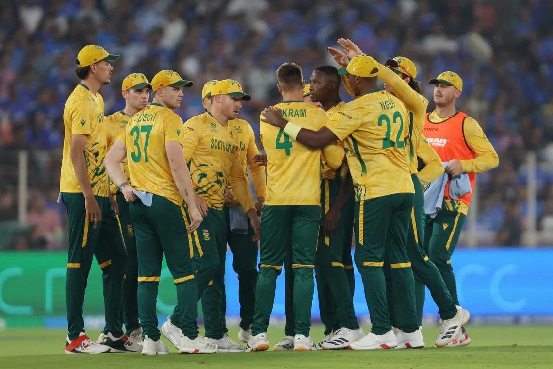 FILE PHOTO: Cricket - ICC Men's T20 World Cup 2026 - Super 8 - India v South Africa - Narendra Modi Stadium, Ahmedabad, India - February 22, 2026 South Africa's Aiden Markram celebrates with teammates after taking the wicket of India's Ishan Kishan, caught out by Ryan Rickelton REUTERS/Amit Dave/File Photo