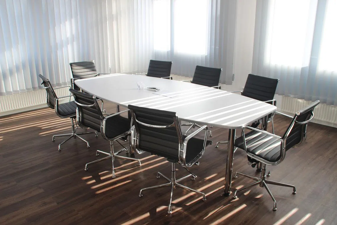 Oversized meetings of all kinds allow bores to hold court while most people check their phones.