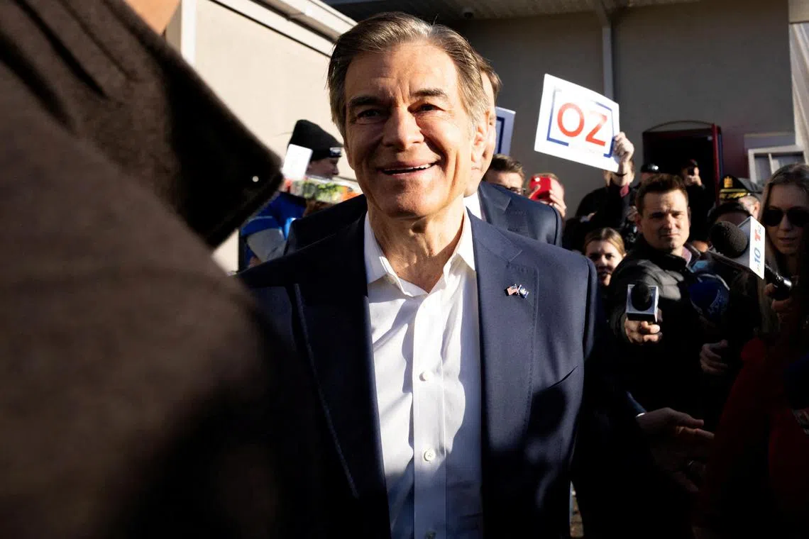 FILE PHOTO: Republican Senate candidate Dr. Mehmet Oz departs from his polling location after voting in the 2022 U.S. midterm election in Bryn Athyn, Pennsylvania, U.S., November 8, 2022. REUTERS/Hannah Beier/File Photo
