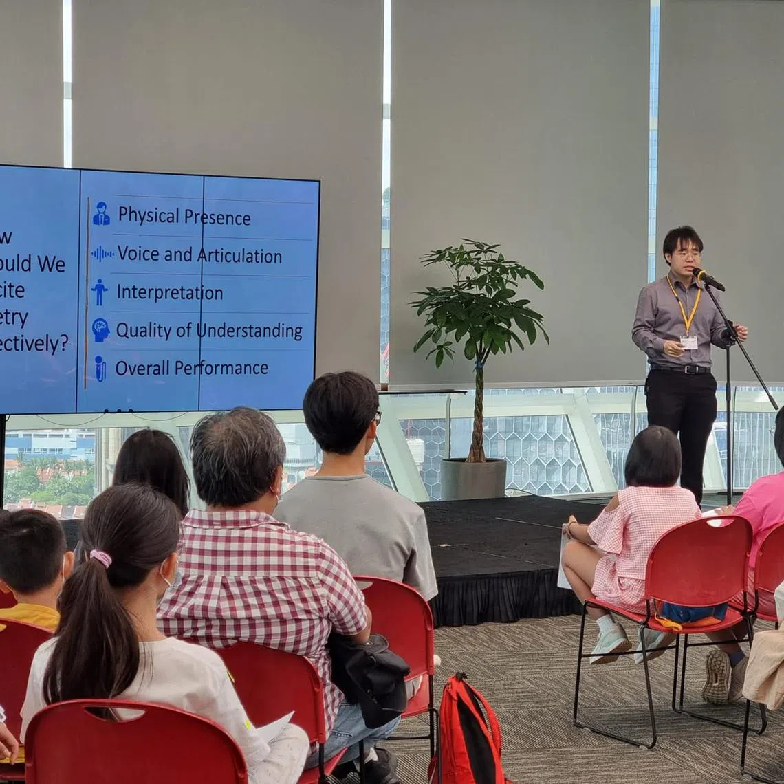 Ow Yeong Wai Kit, 34, poet and organiser of the National Poetry Recitation Competition facilitating a poetry recitation workshop at the National Library on June 9th 2023. 

Source: Poetry Festival Singapore