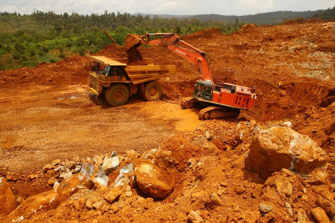 A truck loads earth containing nickel ore on Halmahera island in eastern Indonesia.
