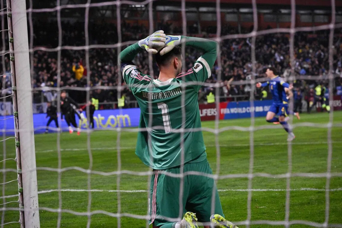 Italy's goalkeeper Gianluigi Donnarumma reacting after the 4-1 penalty shoot-out defeat by Bosnia and Herzegovina at the Bilino-Polje stadium in Zenica on March 31, 2026. The match ended 1-1 after extra time.